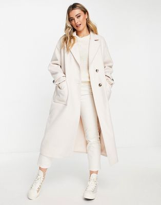The Frolic longline coccoon coat in pastel cream-White