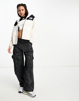 The North Face 86 hooded mountain windbreaker in off white and black