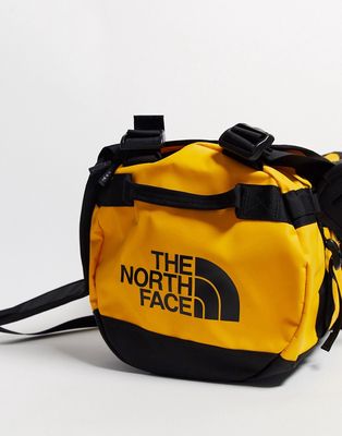 The North Face Base Camp 31l small duffel bag in yellow and black