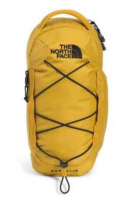 The North Face Borealis Water Repellent Sling Backpack in Mineral Gold/Tnf Black