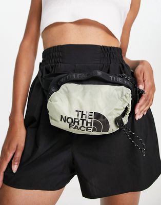 The North Face Bozer small fanny pack in light green