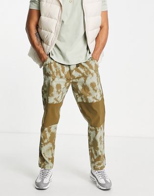 The North Face Class V belted pants in green tie dye