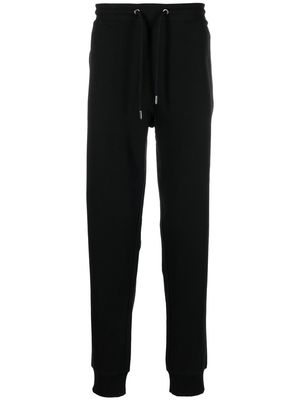 The North Face embroidered-logo cotton track pants - Black