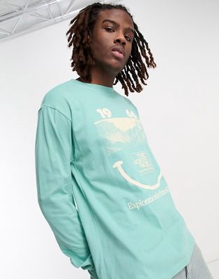 The North Face Heavyweight chest print long sleeve t-shirt in green