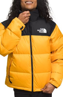 The North Face Men's 1996 Retro Nuptse 700 Fill Power Down Packable Jacket in Summit Gold/Tnf Black