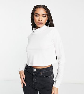 The North Face Nekku high neck cropped long sleeve top in white - Exclusive to ASOS