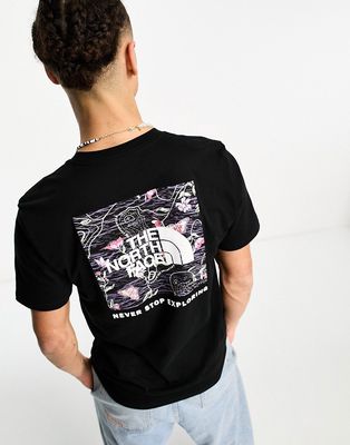 The North Face NSE Box back print logo t-shirt in black floral print
