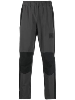 The North Face NSE Shell logo-print track pants - Grey
