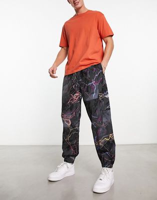 The North Face nylon utility trail glow print sweatpants in black