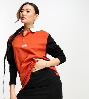 The North Face Rugby boyfriend fit heavyweight polo in black and red Exclusive at ASOS-Orange