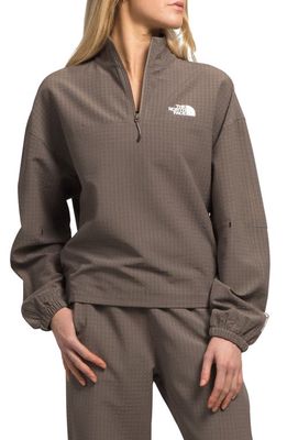 The North Face Tekware Grid Water Repellent Quarter Zip Pullover in Falcon Brown