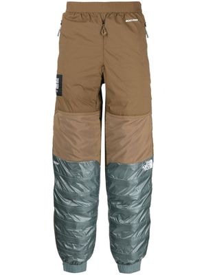 The North Face x Undercover 50/50 down trousers - Brown