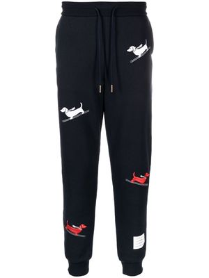 Thom Browne all-over holiday motif trousers - Blue
