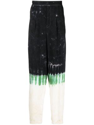 Toga Virilis tie-dye print straight-leg trousers - Black