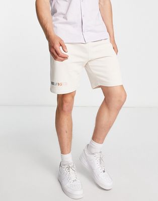 Tommy Hilfiger multi logo sweat shorts in cream-White