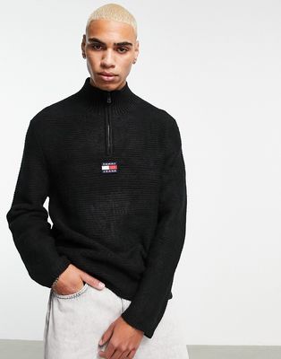 Tommy Jeans central badge logo half zip relaxed fit knit sweater in black
