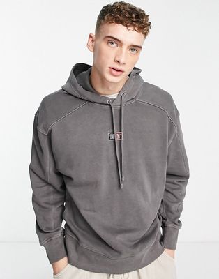 Tommy Jeans tiny center flag logo hoodie in wash black