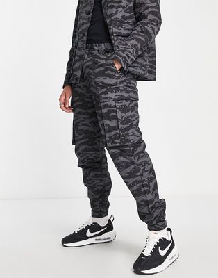 Topman relaxed with all-over animal print cargo pants in charcoal-Black
