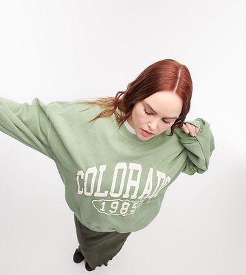 Topshop Curve graphic Colorado vintage wash oversized sweatshirt in sage-Green