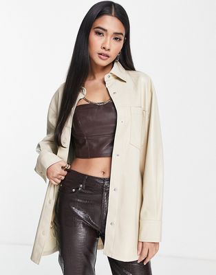 Topshop faux leather shirt with front pockets in cream-White