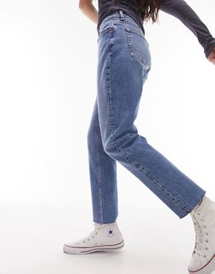 Topshop mid rise straight jeans with raw hem in mid blue
