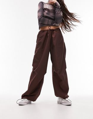Topshop oversized balloon nylon parachute pants in chocolate-Brown