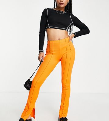 Topshop Petite exposed seam skinny flare pants in orange