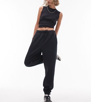 Topshop Petite oversized cuff sweatpants in washed black