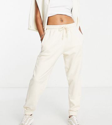 Topshop Petite slouchy oversized cuffed sweatpants in ecru-White