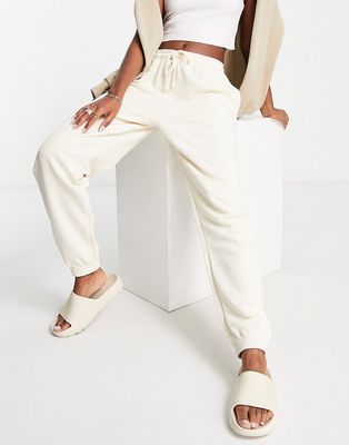 Topshop slouchy oversized cuffed sweatpants in ecru-White