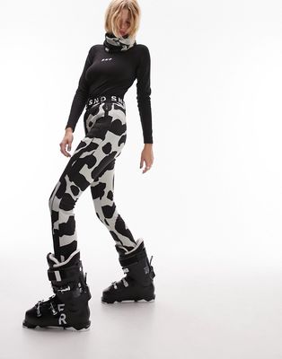 Topshop Sno cow print stretch slim leg ski pants with stirrups in multi