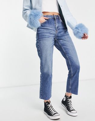 Topshop straight jeans with raw hems in mid blue