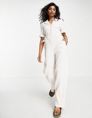 Topshop textured button up drawstring jumpsuit in sand-Neutral