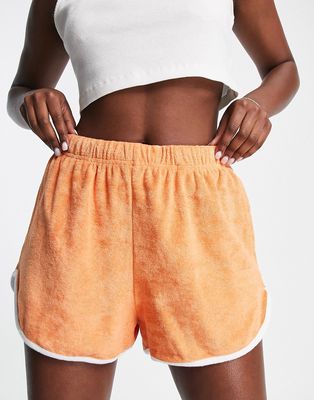 Topshop Towelling runner short with piping in orange