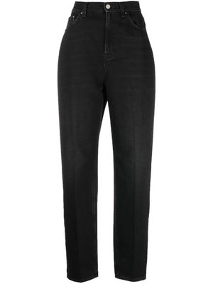 TOTEME faded-effect tapered-leg jeans - Black