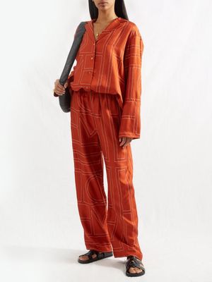 Toteme - Logo-embroidered Twill Trousers - Womens - Dark Orange