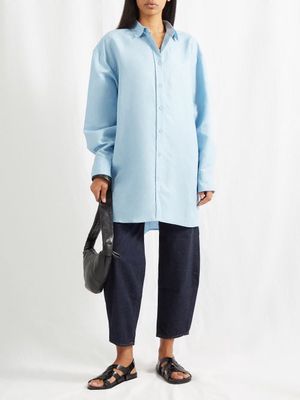 Toteme - Longline Monogram-embroidered Lyocell-blend Shirt - Womens - Light Blue