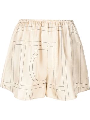 TOTEME monogram-print silk shorts - Neutrals