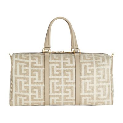 Travel bag in raffia with monogram and smooth leather