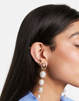 True Decadence pearl drop earrings in gold
