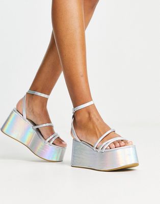 Truffle Collection extreme flatform heeled sandals in silver holographic