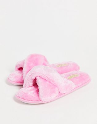 Truffle Collection faux fur cross strap slippers in pink