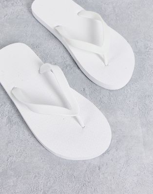 Truffle Collection flip flops in white