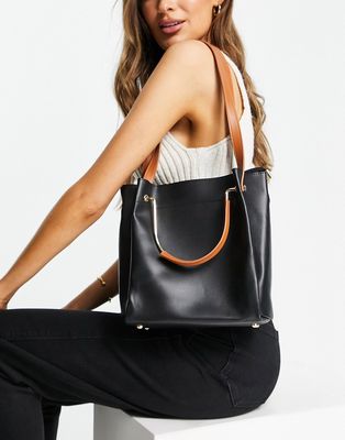 Truffle Collection tote bag with tan handle and straps in black