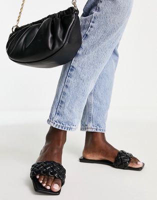 Truffle Collection woven square toe flat sliders in black