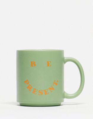 Typo 'Be Present' mug in green