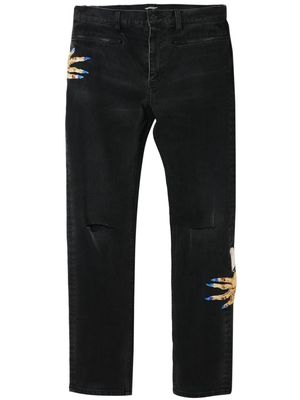 Undercover motif-embroidered straight-leg jeans - Black