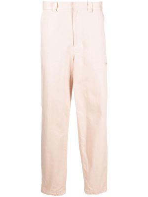 Undercover tapered-leg slip pocket trousers - Pink