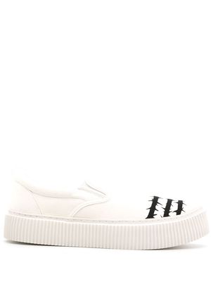 Undercoverism graphic-print slip-on trainers - White