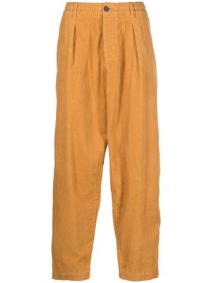 Universal Works pleat-detail wide-leg corduroy trousers - Yellow
